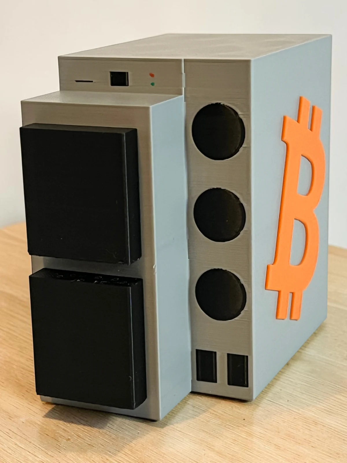 3D printed Bitcoin ASIC miner replica in gray black and orange