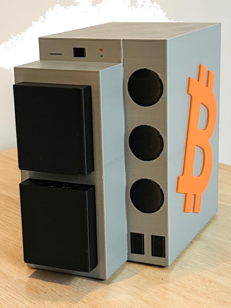3D printed Bitcoin ASIC miner replica in gray, black and orange
